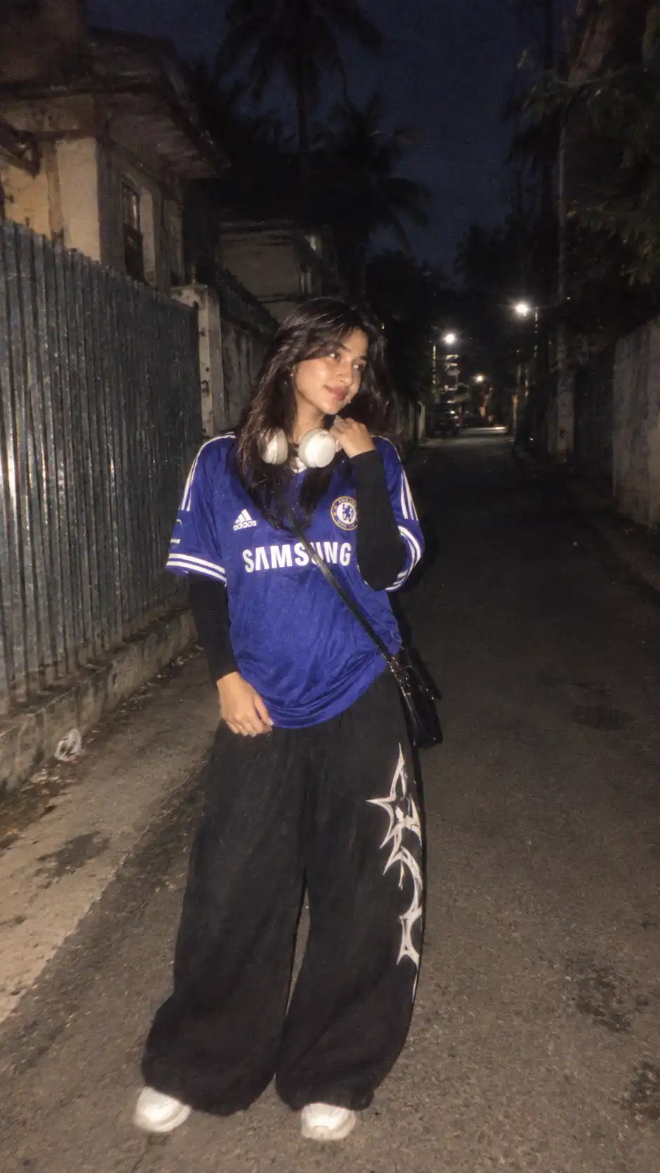 Example result for Y2K Night Street Football Jersey Photo AI image prompt